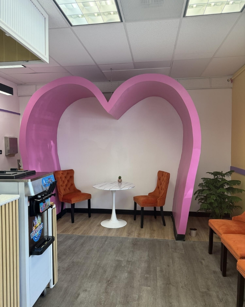 Pink heart-shaped photo booth at Crunchy Sweet, a Ice Cream Shop in Portland