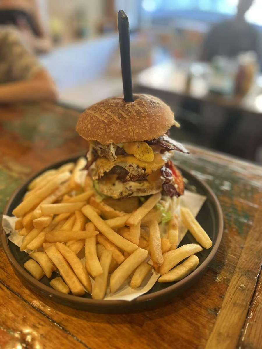 Triple - layer hamburger with fries at DA DAMASO，a Italian Restaurant in Staten Island