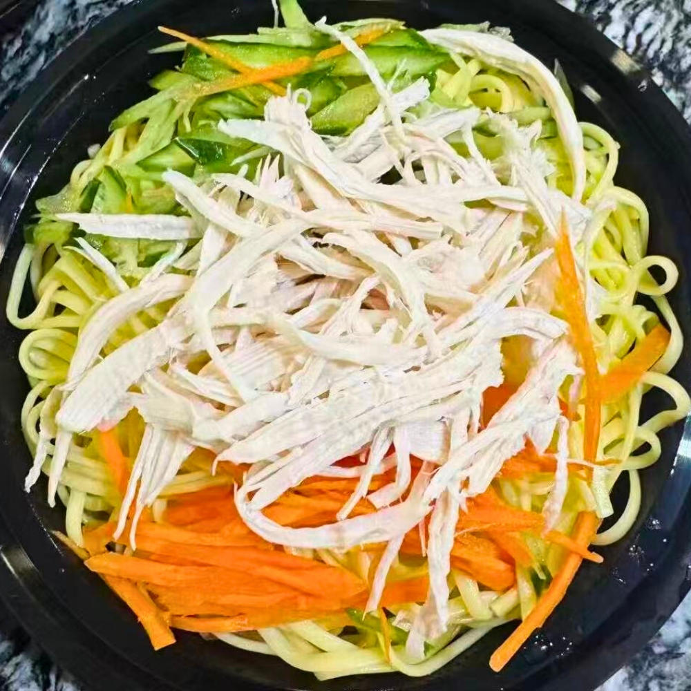 Cold noodles with chicken shreds and veggies at Dallas Spicy Chinese Cuisine, a Chinese Restaurant in Plano.