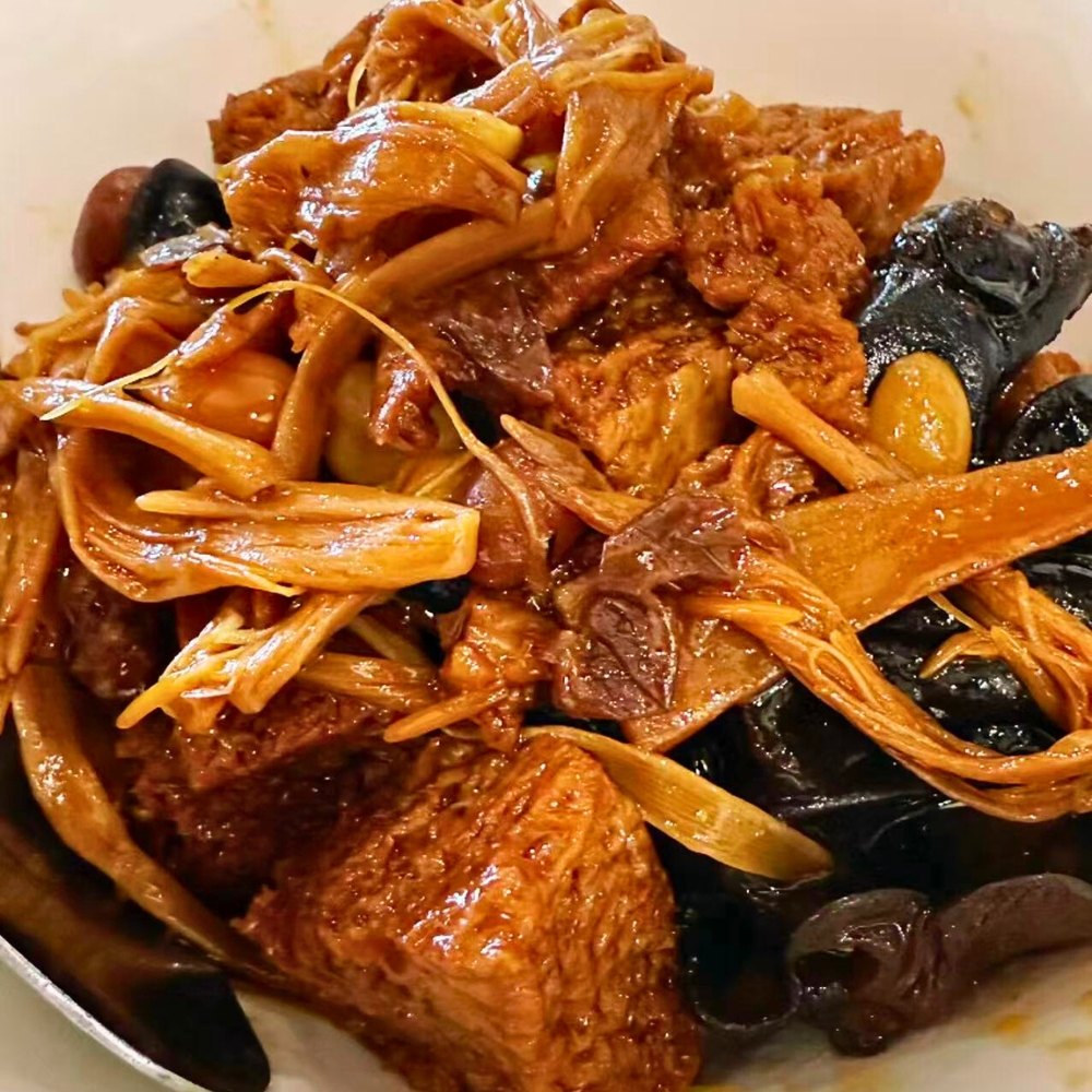 Four joy braised gluten with veggies at Dallas Spicy Chinese Cuisine, a Chinese Restaurant in Plano.