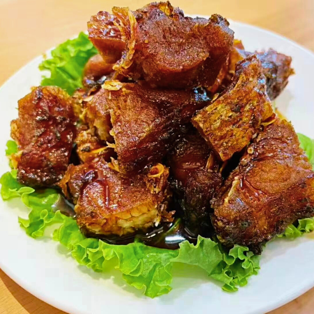 Shanghai smoked fish with lettuce at Dallas Spicy Chinese Cuisine, a Chinese Restaurant in Plano.