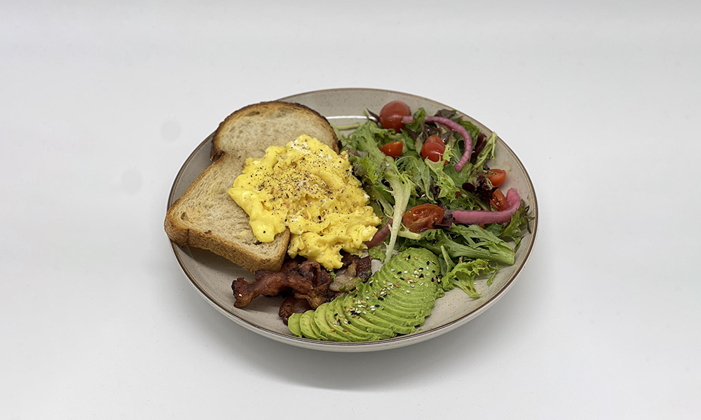 BEA Plate, a well - balanced dish with toast, eggs, avocado and salad at Dandelion Kaffe，a Brunch Restaurant in Alameda