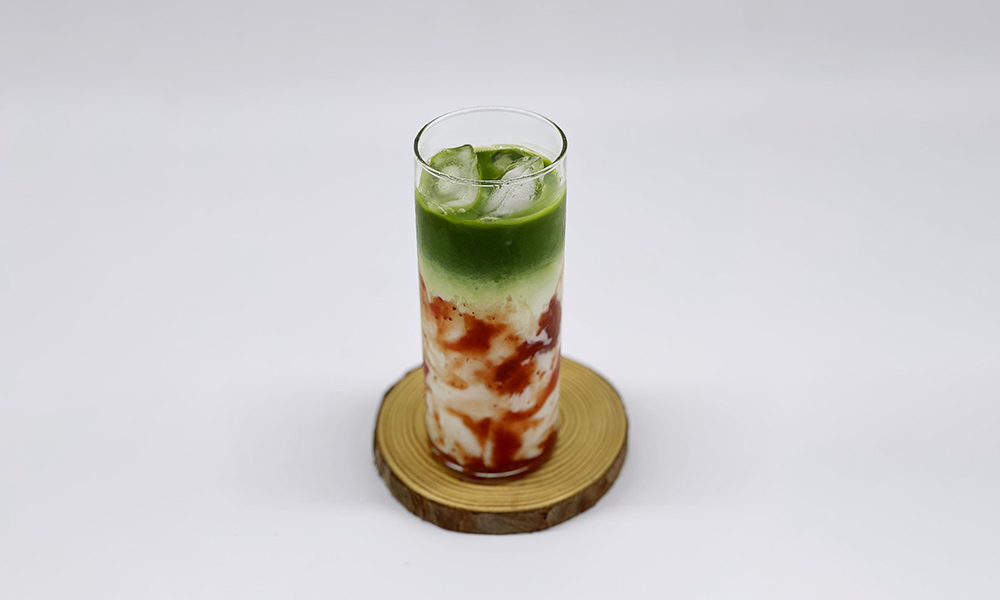 a layered drink with strawberry and matcha at Dandelion Kaffe，a Brunch Restaurant in Alameda