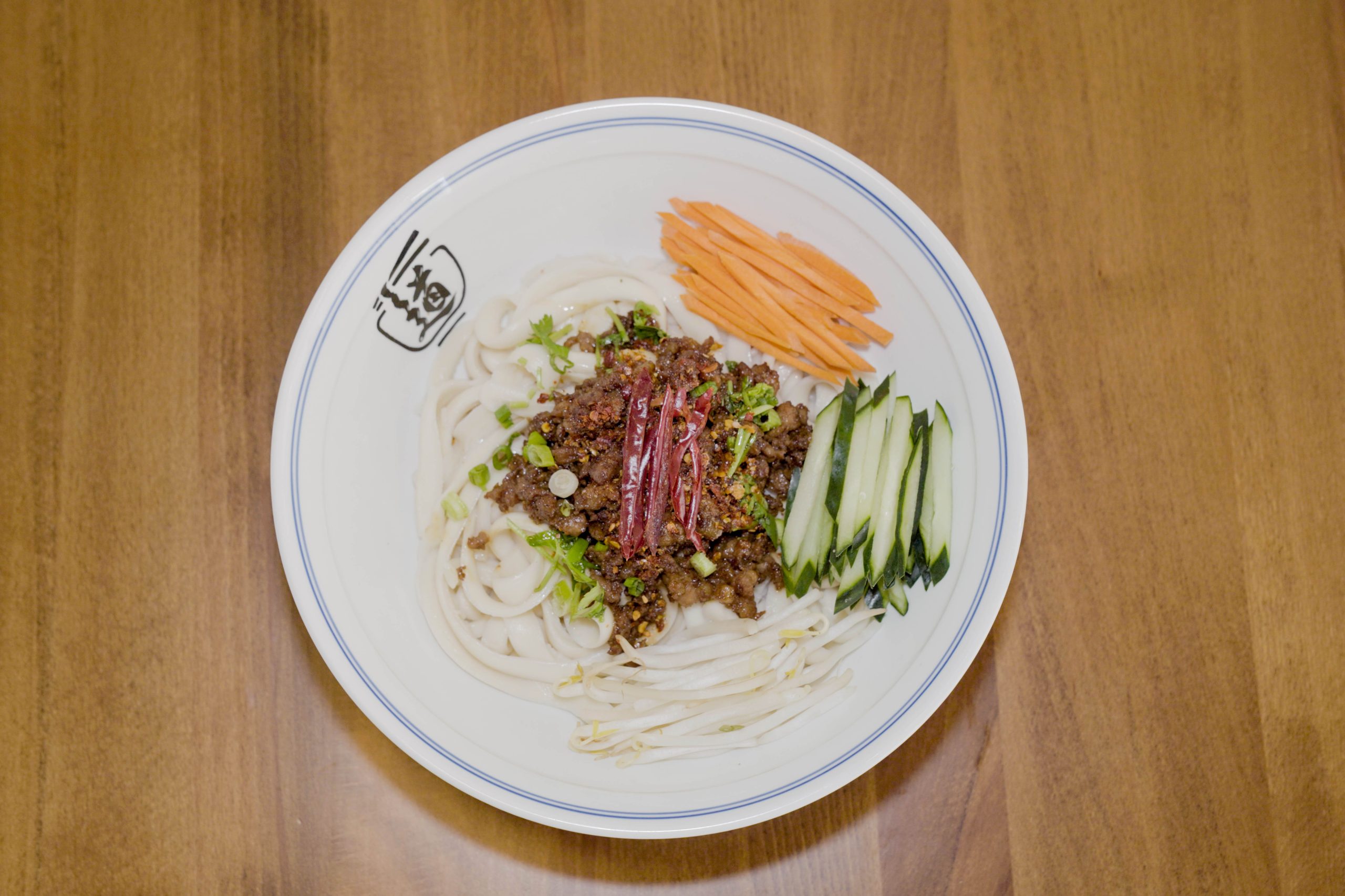 Dandan noodles with minced meat, veggies, and spicy sauce at Dao Artisan Noodle, a Chinese Restaurant in San Leandro