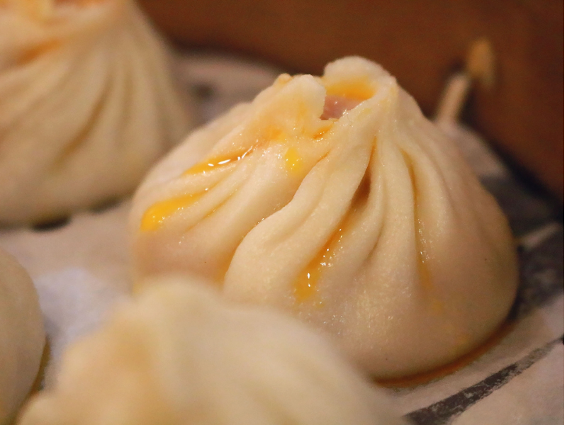 Delicious-Dumpling-House-Dumpling-restaurant-Xiaolongbao-Yuba-City Juicy xiaolongbao with savory broth inside at Delicious Dumpling House, a Chinese restaurant in Yuba City.