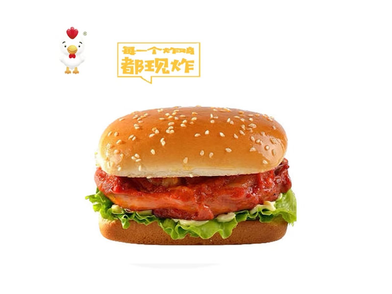 Marinated chicken burger with fresh lettuce and sesame seed bun at Delicious Fried, a Fast‑food Restaurant in Los Angeles