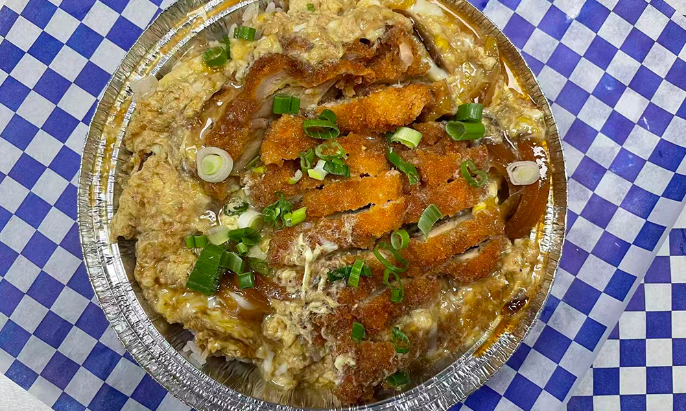 Chicken katsu with egg and rice in a savory broth, a comforting bowl at Devils Kitchen & Teppan, a Asian Restaurant in Eastvale