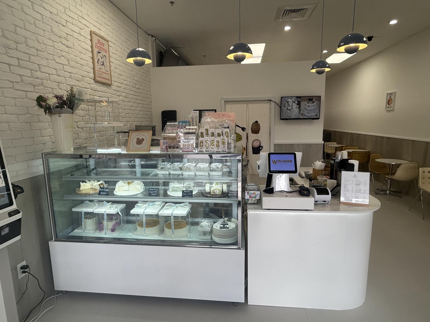 D-For-Dessert-Coffee&Cake-Shop-Dessert-Display-Counter-Hollywood Glass display counter with assorted cakes & desserts at D For Dessert, a Coffee & Cake Shop in Hollywood