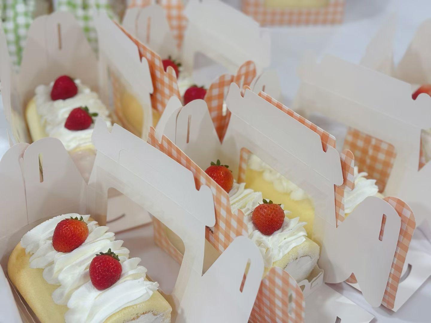 Single-serve strawberry Swiss roll with cream filling in packaging at D For Dessert, a Coffee & Cake Shop in Hollywood