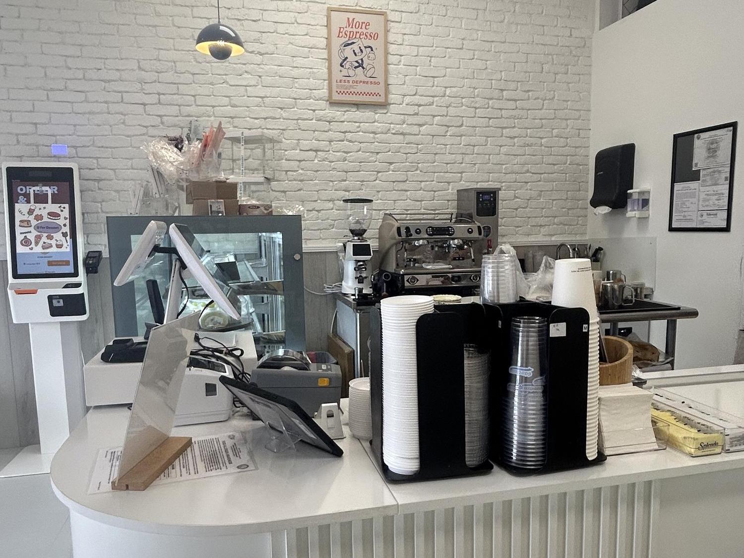 D-For-Dessert-Coffee&Cake-Shop-Counter-&-Beverage-Station-Hollywood Shop counter with coffee equipment, cups & self-order kiosk at D For Dessert, a Coffee & Cake Shop in Hollywood