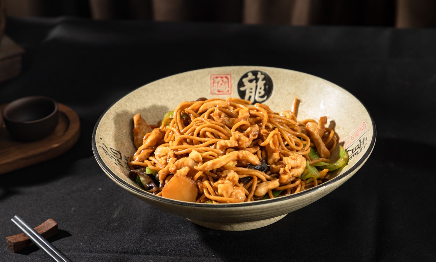 Stir-fried noodles with chicken, mushrooms and vegetables at Dim Sum Bloom Rockville Centre, a Chinese Restaurant in Rockville Centre