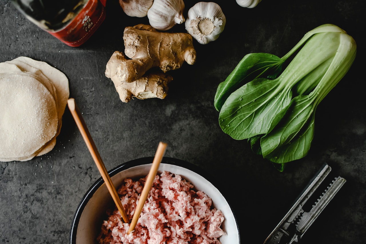 Fresh ingredients arranged for dumpling preparation