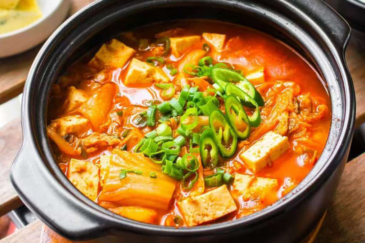 Kimchi soup with pork and tofu in spicy at Dim Sum & Kimchi，a Asian Fusion Restaurant in Bettendorf
