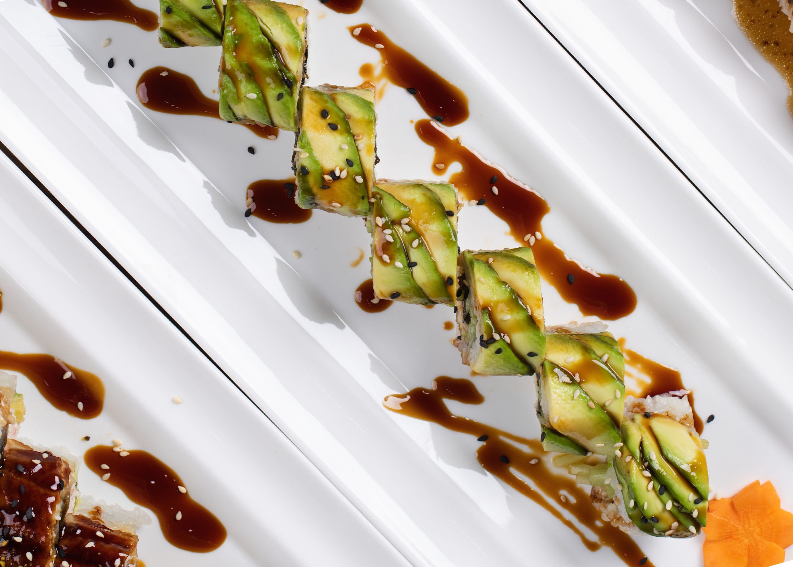 Creamy avocado sushi roll with sesame at Dozo Sushi & Bar, a Japanese Restaurant in Monrovia
