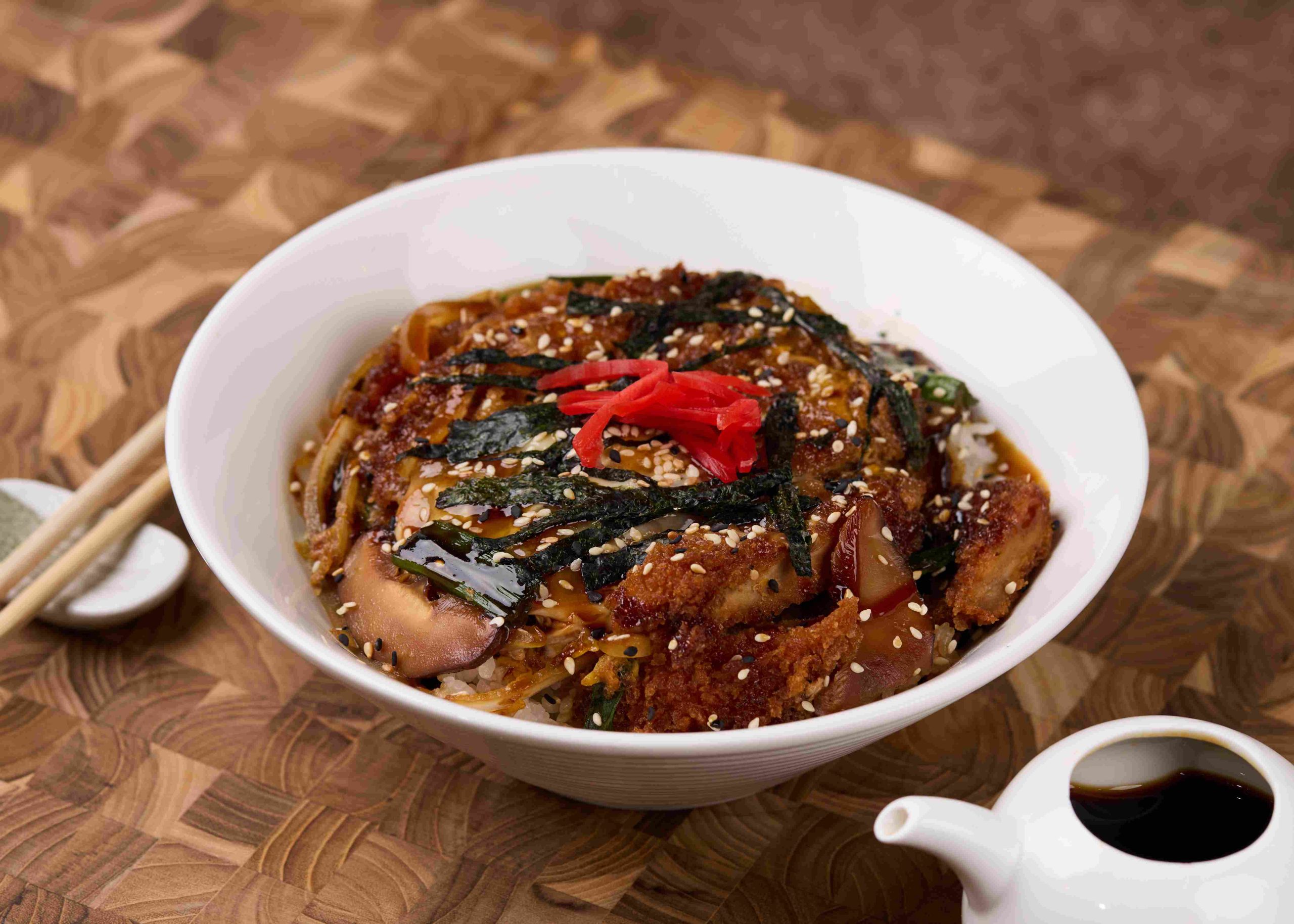 Fried pork over rice with seaweed at Dozo Sushi & Bar, a Japanese Restaurant in Monrovia