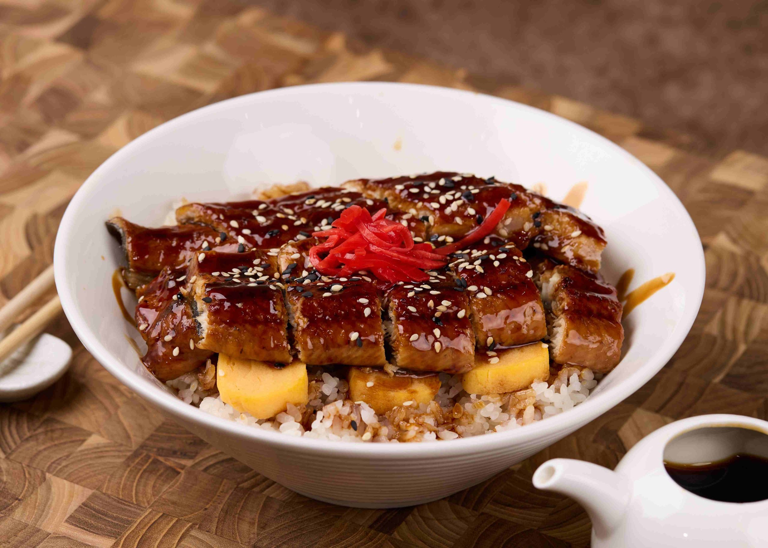 Glazed eel over rice with sesame at Dozo Sushi & Bar, a Japanese Restaurant in Monrovia