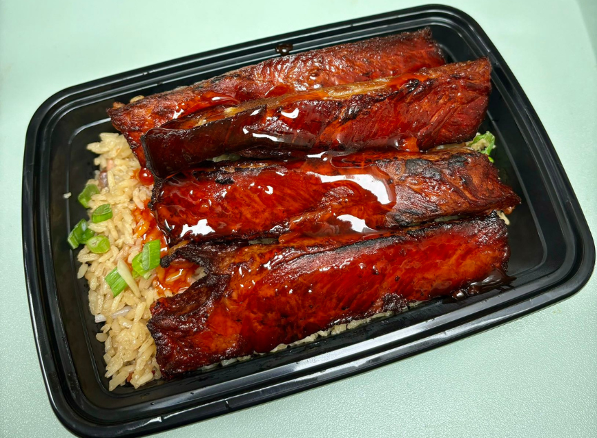 Glazed BBQ spare ribs with fried rice at Dragon 109 of Columbus, a Chinese Restaurant in New York