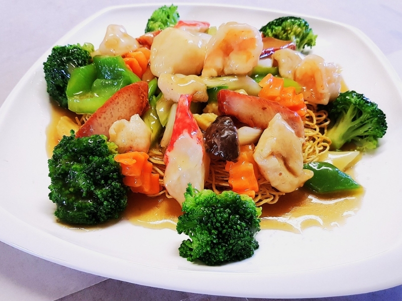 Crispy noodles topped with shrimp, crab, veggies and sauce at Dragon 88, a Chinese Restaurant in Conception Bay South