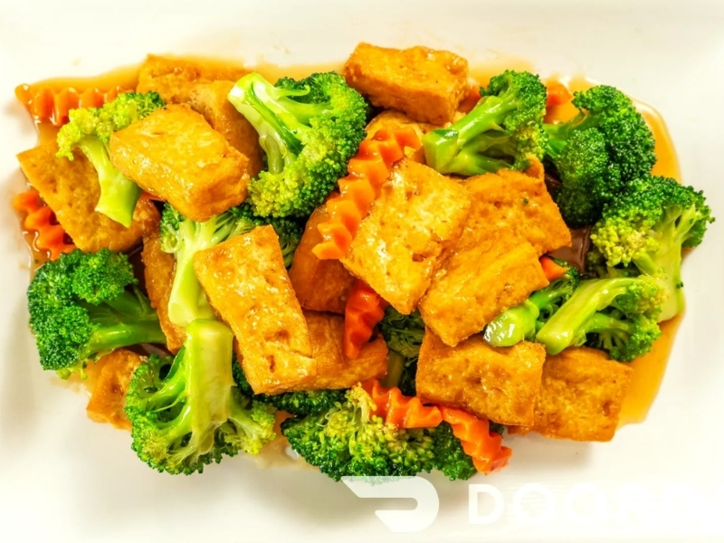 Fried tofu stir-fried with broccoli and carrot in savory sauce at Dragon 88, a Chinese Restaurant in Conception Bay South