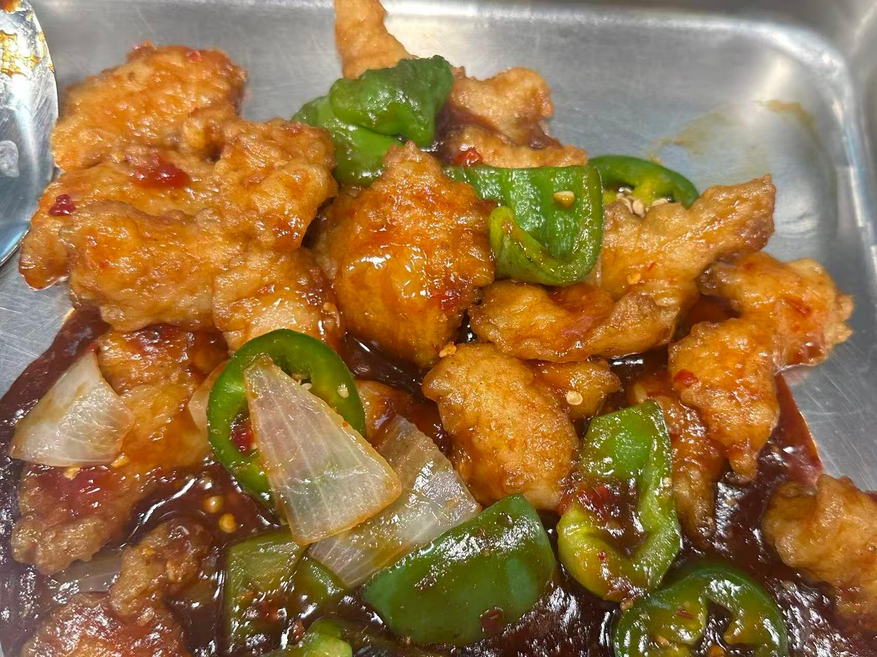 Sweet and sour chicken with green peppers and onions at Dragon Garden, a Chinese Restaurant in Palmdale