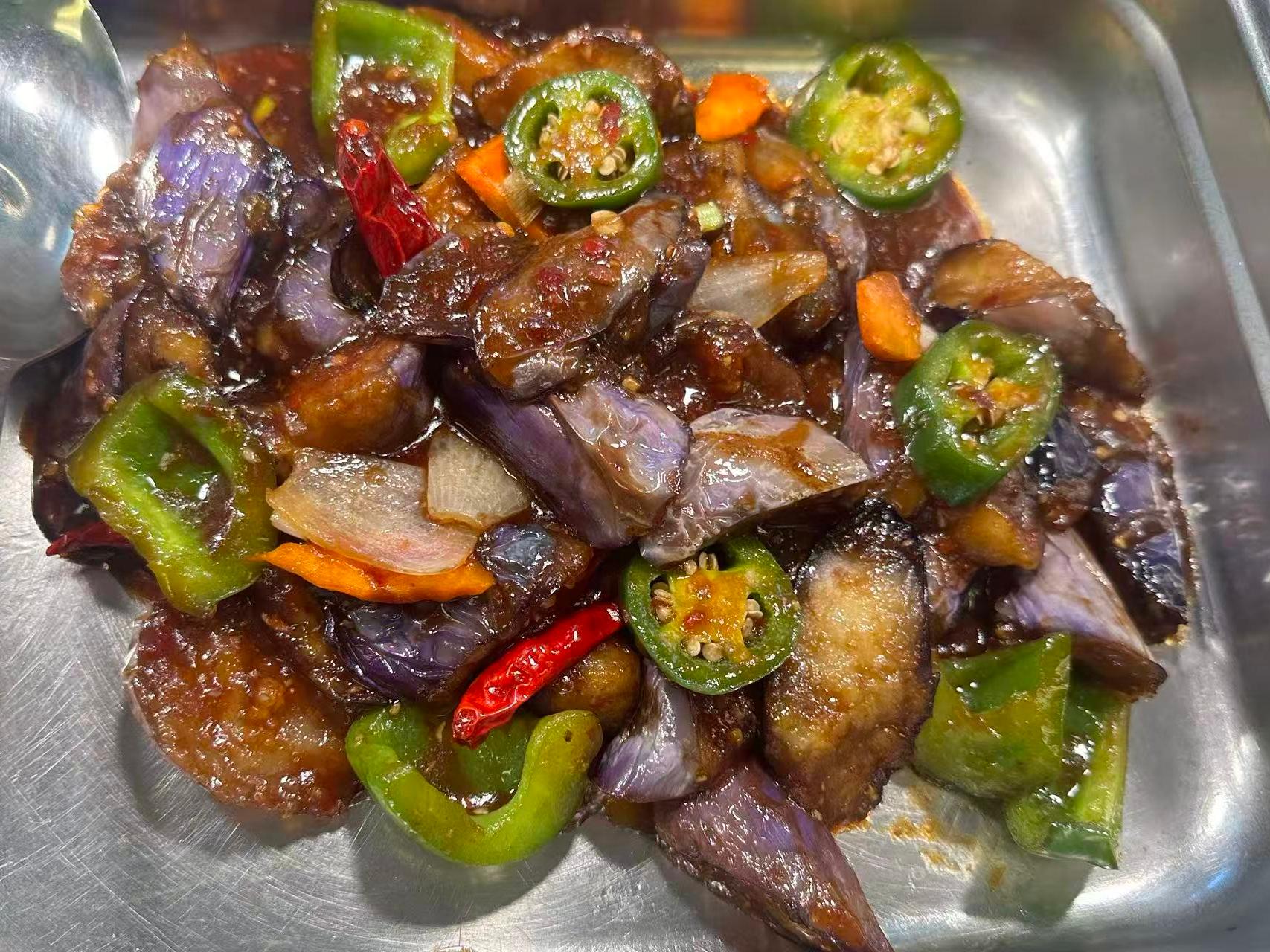 Eggplant stir - fried with green peppers, carrots and chilies at Dragon Garden, a Chinese Restaurant in Palmdale