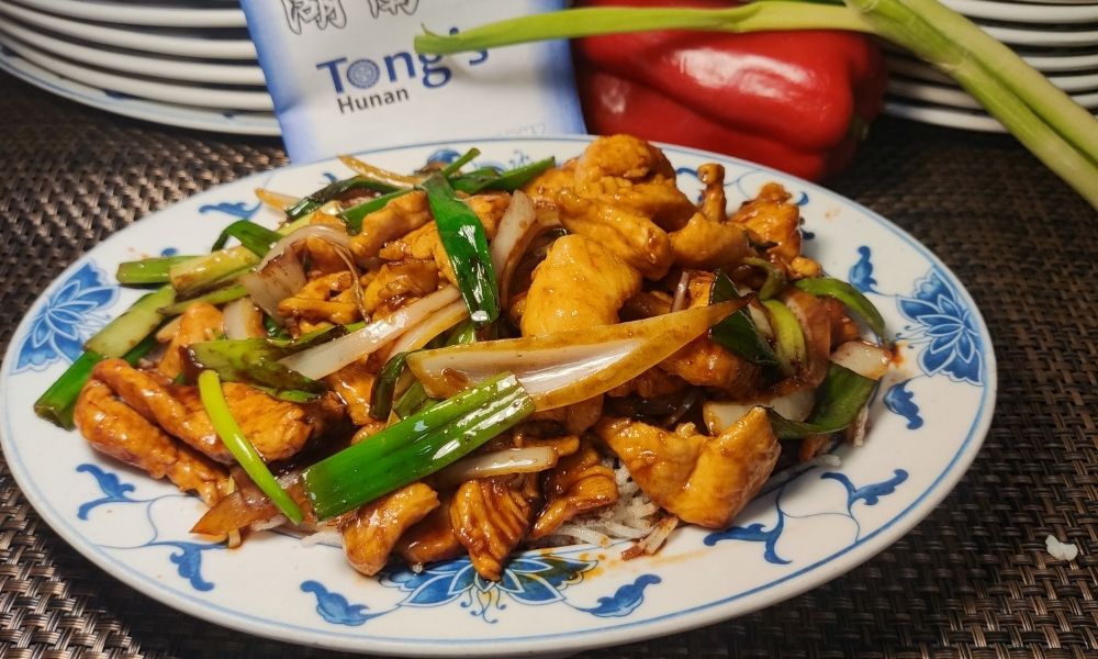 Mongolian chicken stir-fry with scallions and sauce at Tong's Hunan Restaurant, a Chinese Restaurant in Northbrook