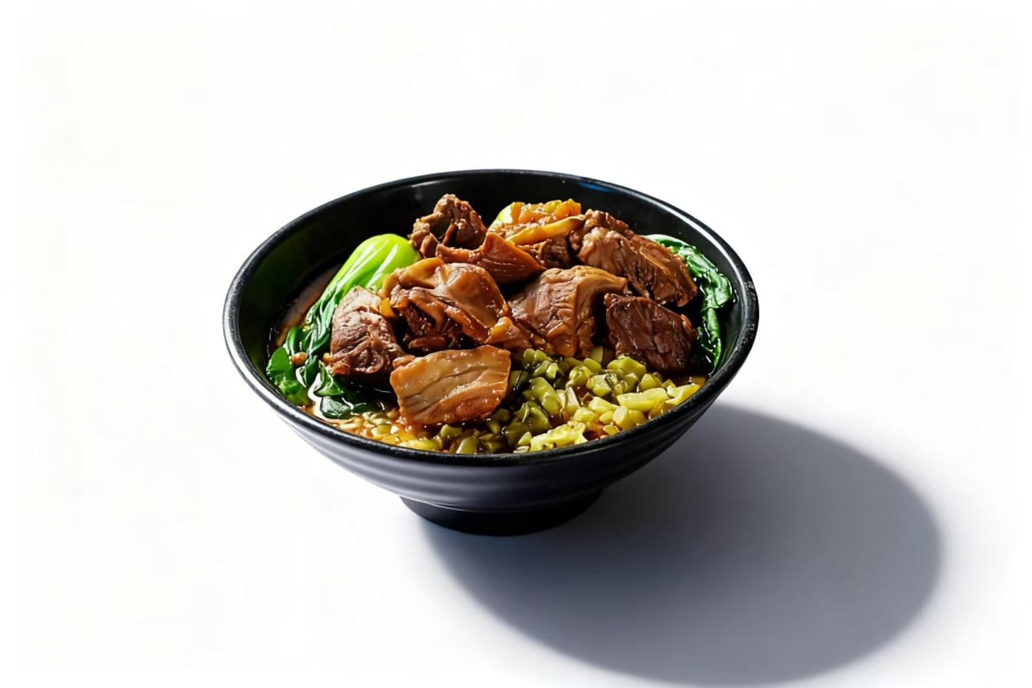Braised beef noodle soup with tender beef and greens at Duck & Dumpling, a Chinese Restaurant in San Antonio
