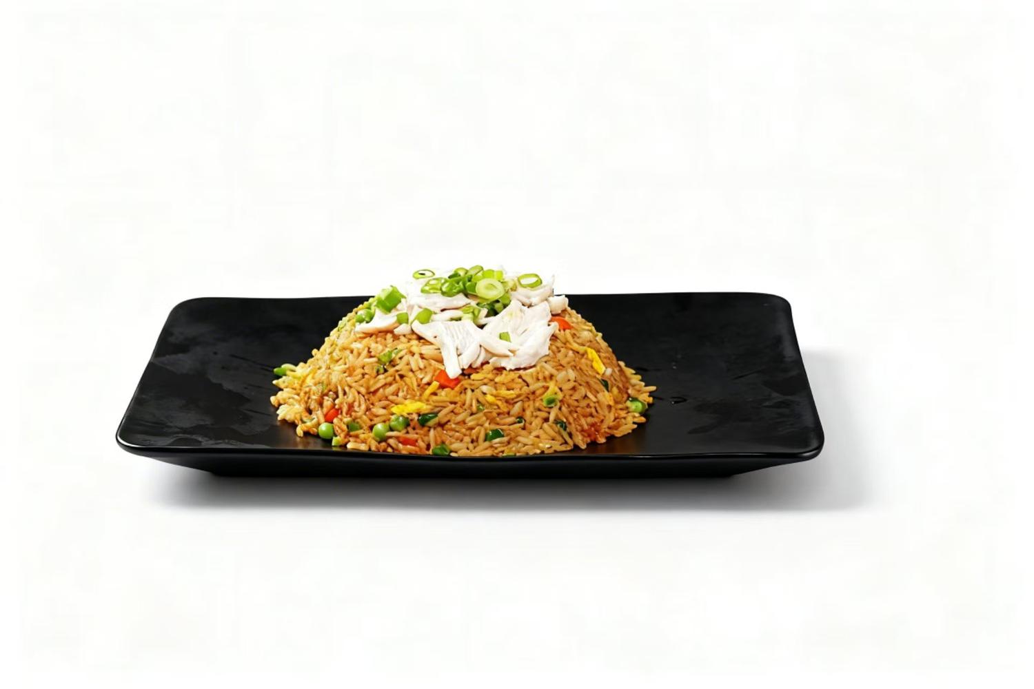 Chicken fried rice topped with scallions at Duck & Dumpling, a Chinese Restaurant in San Antonio