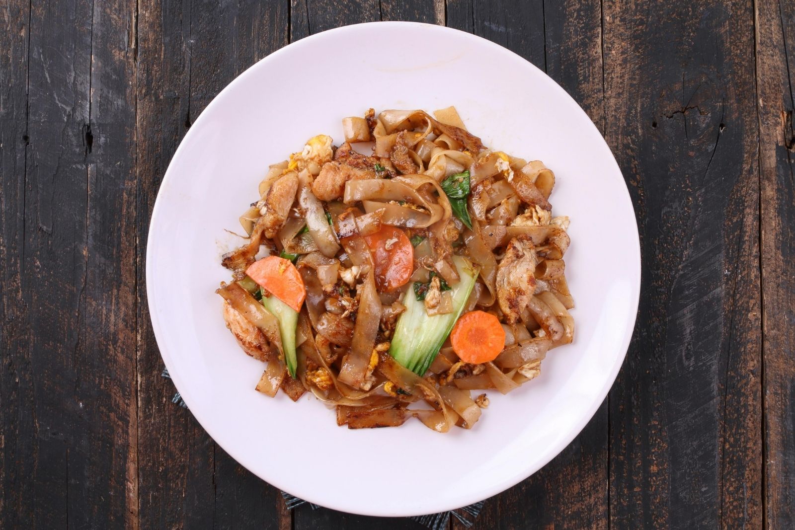 Chicken & vegetable stir-fried flat noodles at Dumpling Bay, a Chinese Restaurant in Golden