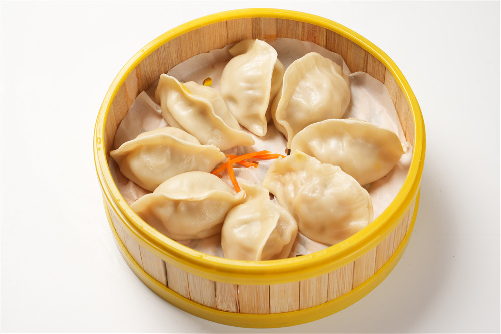 Steamed dumplings in bamboo steamer at Dumpling Delight, a Chinese Restaurant in Millbrae