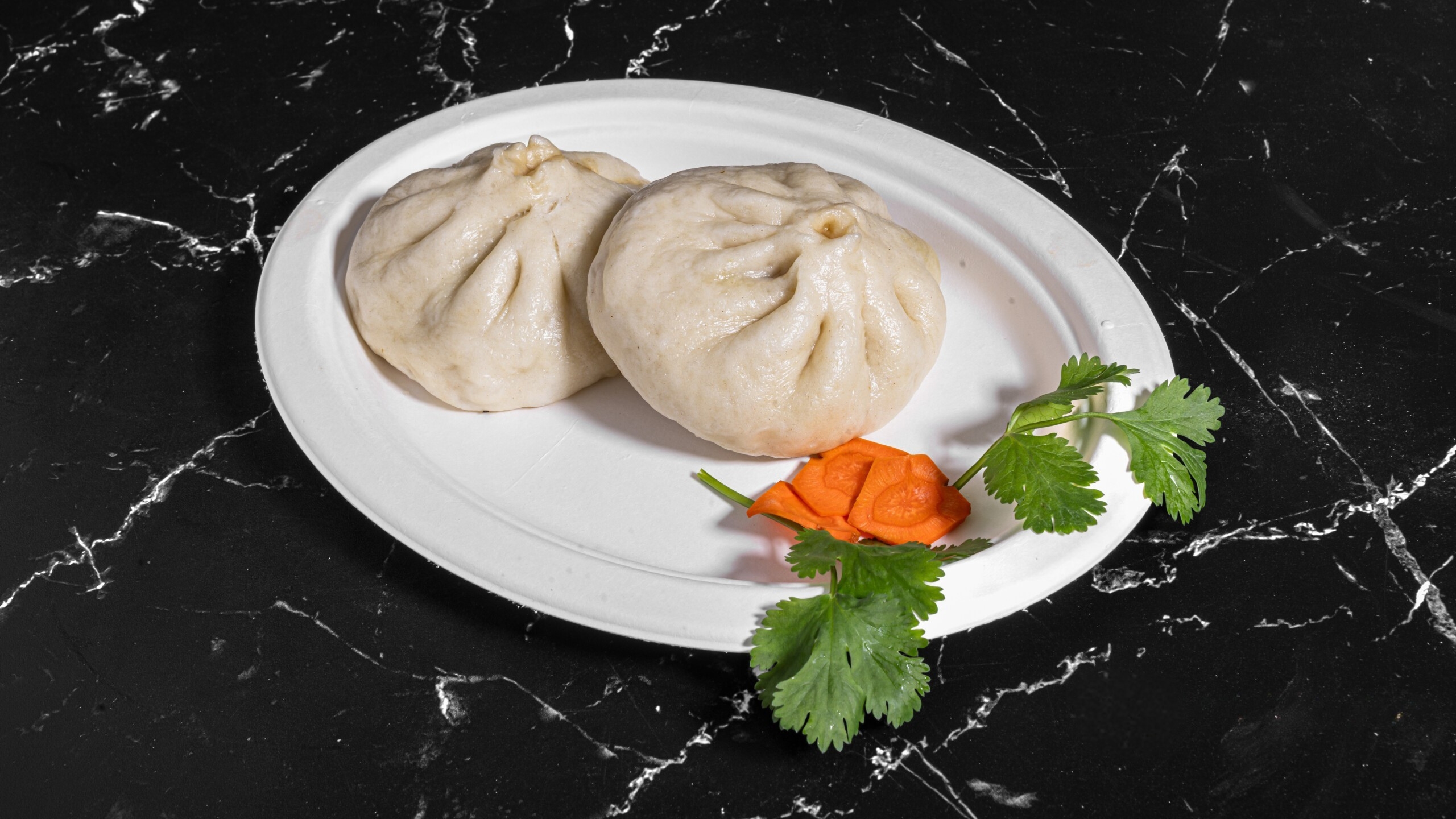 Dumpling-House-Dumpling-Restaurant-steamed-buns-Alameda Soft steamed buns on a plate at Dumpling House, a Dumpling Restaurant in Alameda