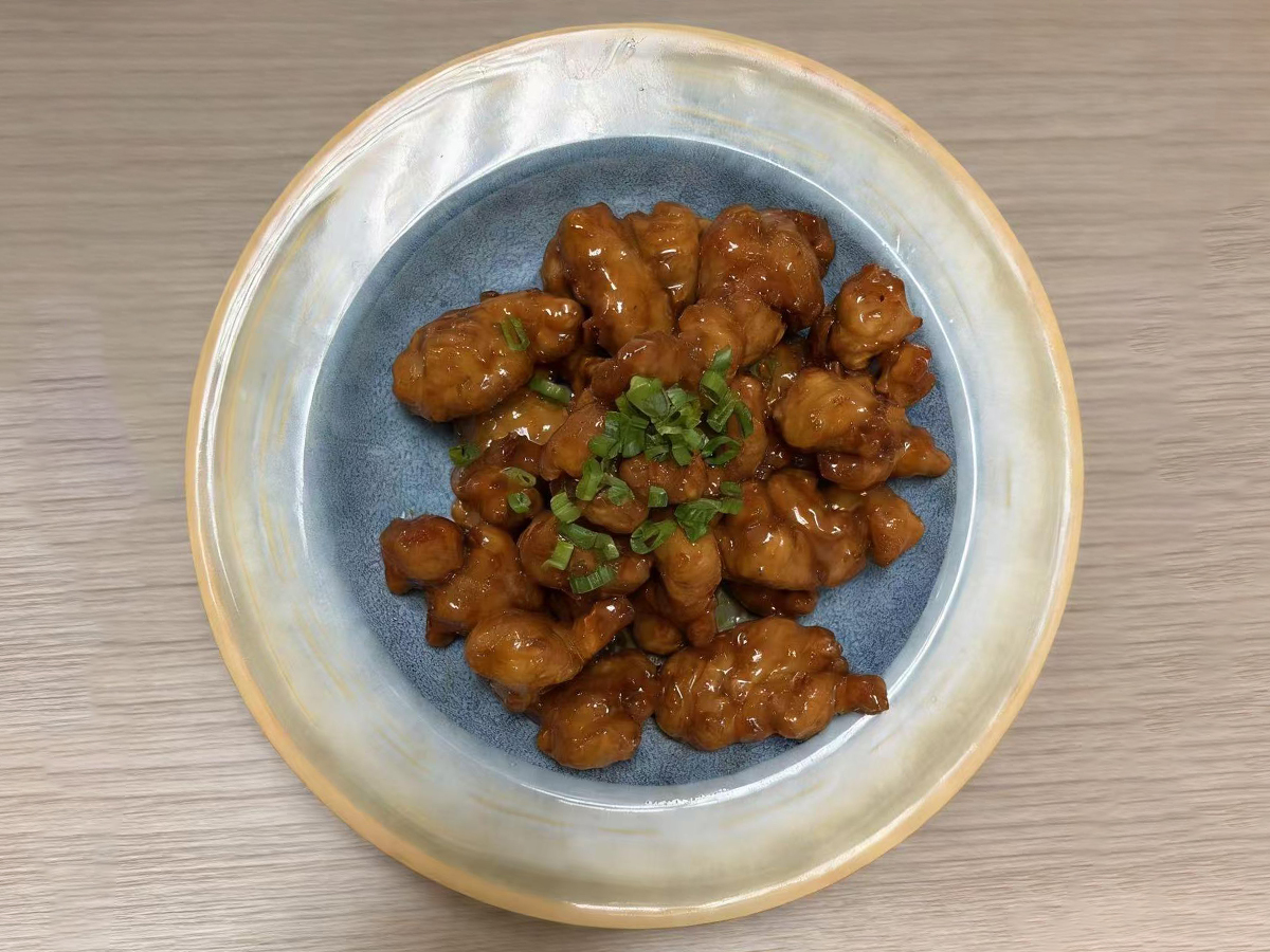 Generous serving of tender sweet and sour pork with rich sauce at Dumpling House, an Asian Restaurant in Harrisonburg