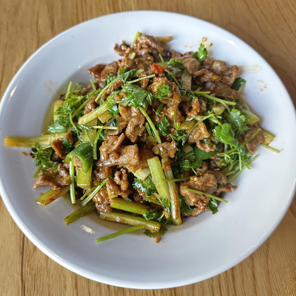 Flavorful beef stir-fried with herbs and vegetables at Dumpling King Asian Cuisine in Sacramento