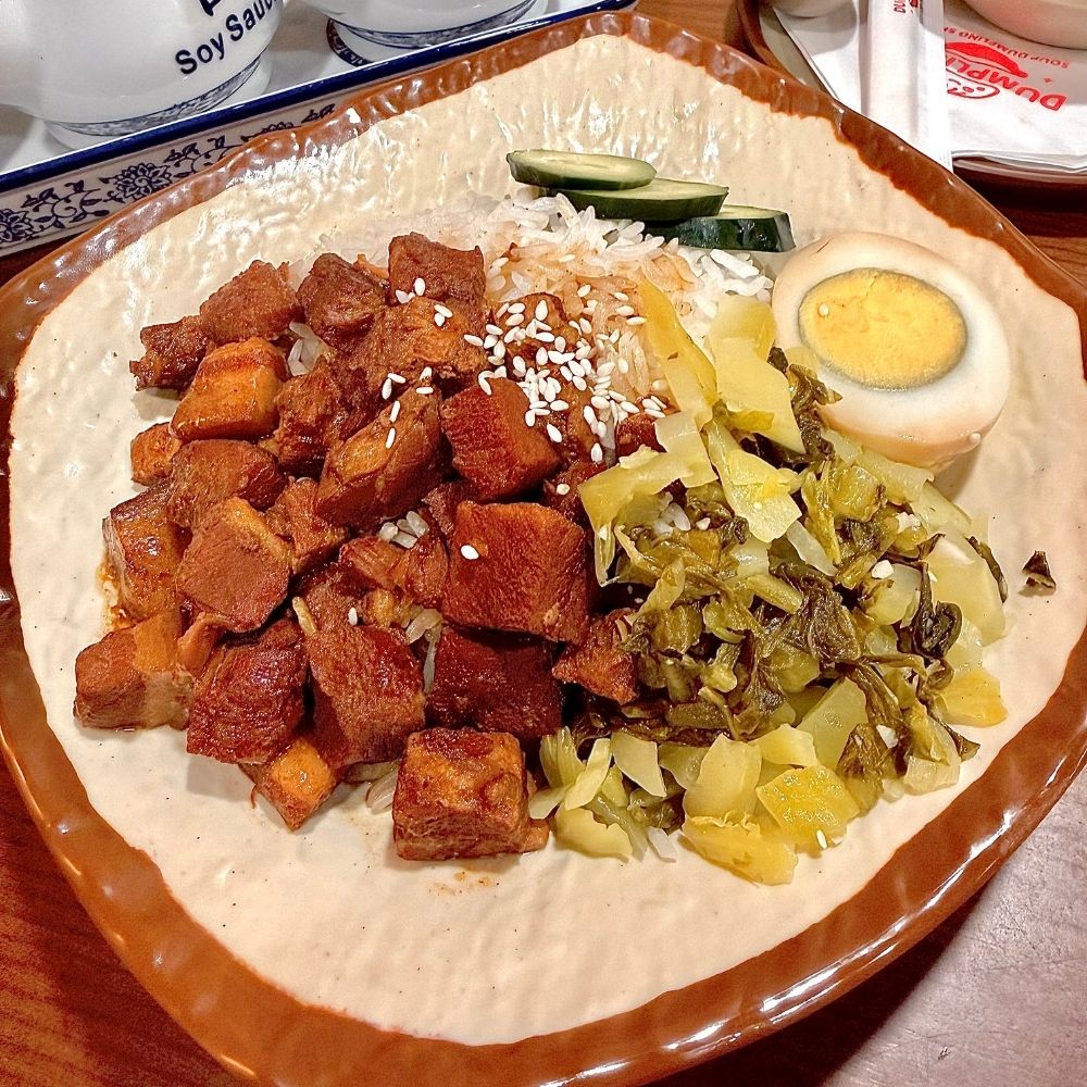 Rice with braised pork, pickles and egg at Dumpling U, a Chinese Restaurant in Fresno