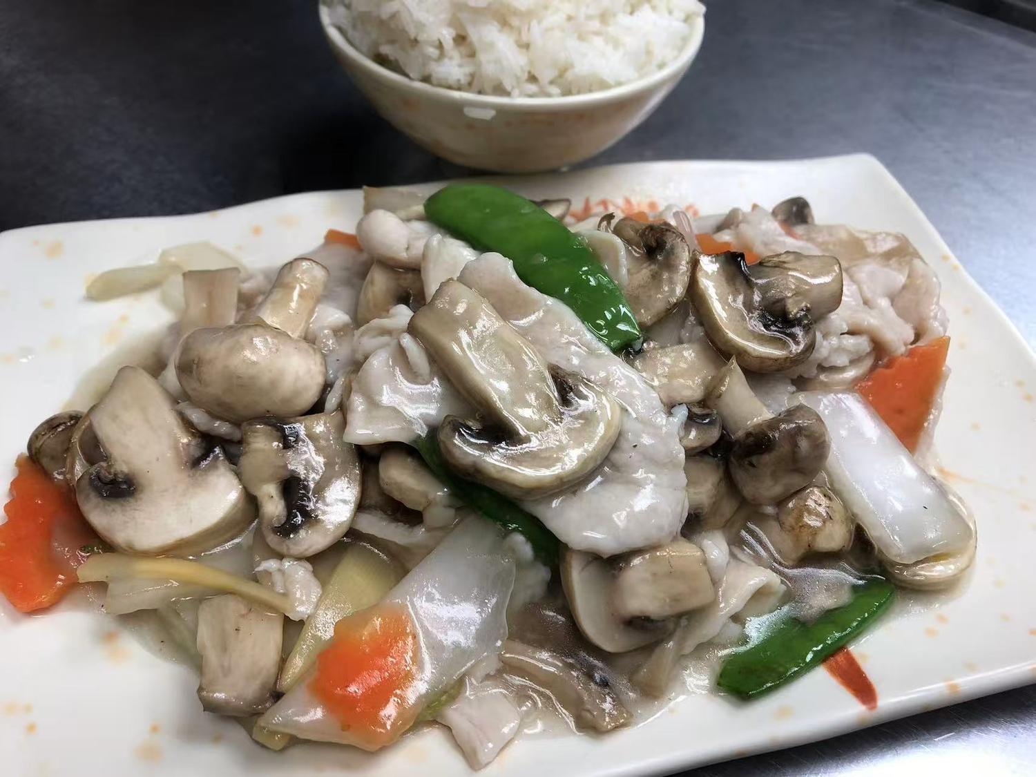 Mushroom chicken stir-fry with vegetables served with steamed rice at East China, a Chinese restaurant in Waterloo