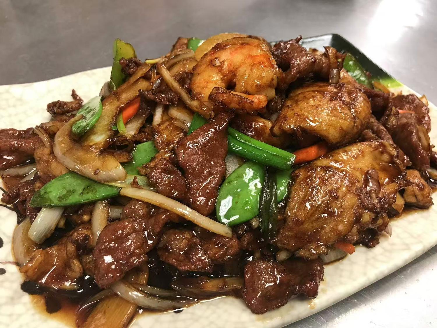 Beef and shrimp stir-fry with vegetables in a dark sauce at East China, a Chinese restaurant in Waterloo