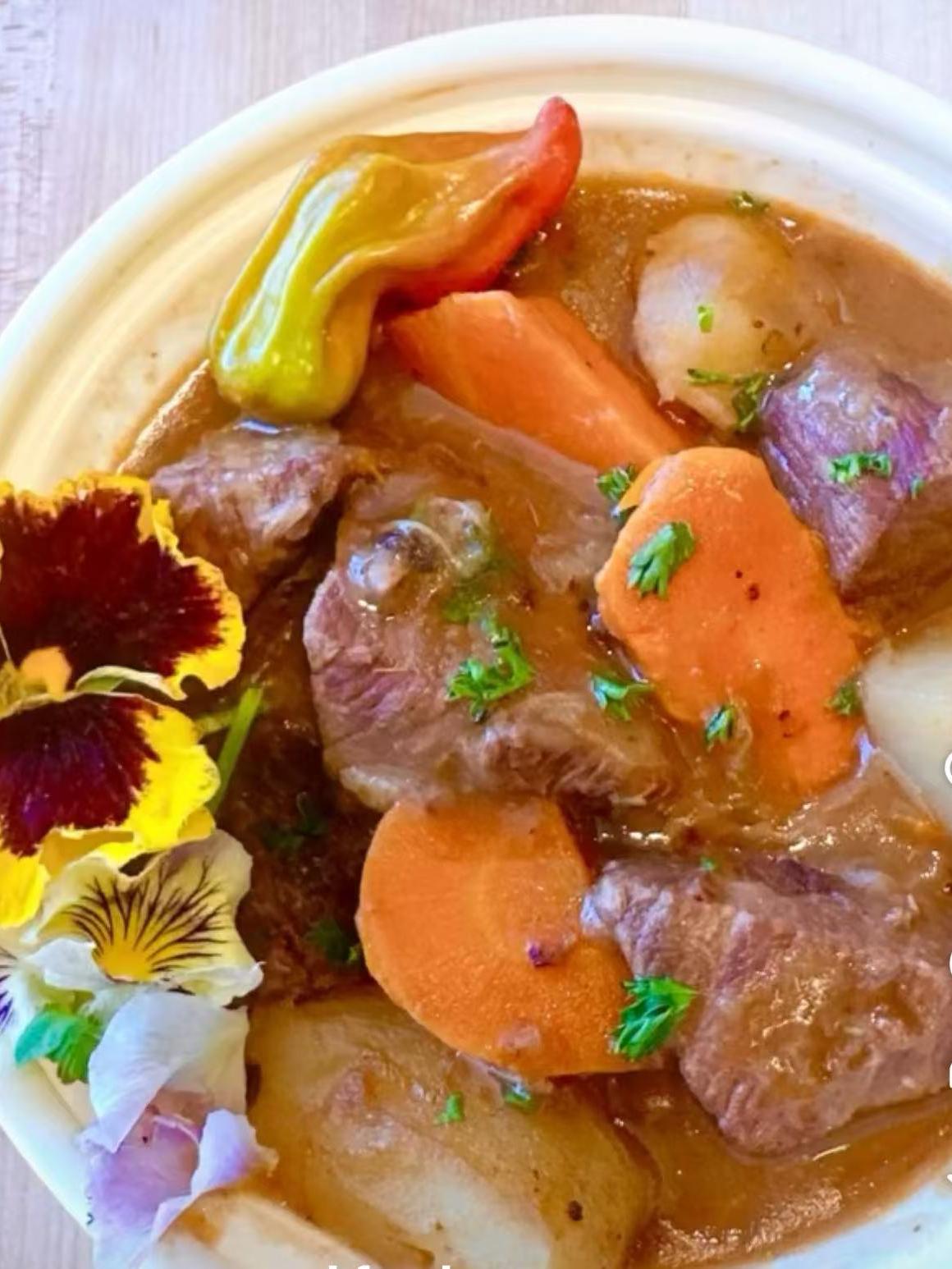 Tender beef stew with carrots, potatoes and peppers at EatGrand, a Japanese Restaurant in Los Angeles