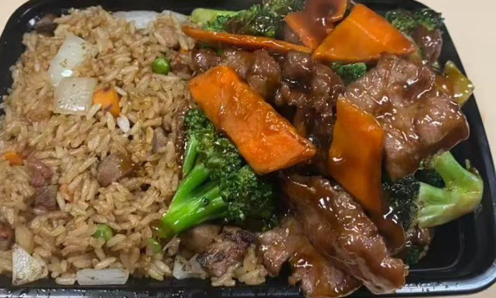 Tender beef, fresh broccoli, and flavorful fried rice, all coated in savory sauce at Nihao, a Chinese Restaurant in Lexington