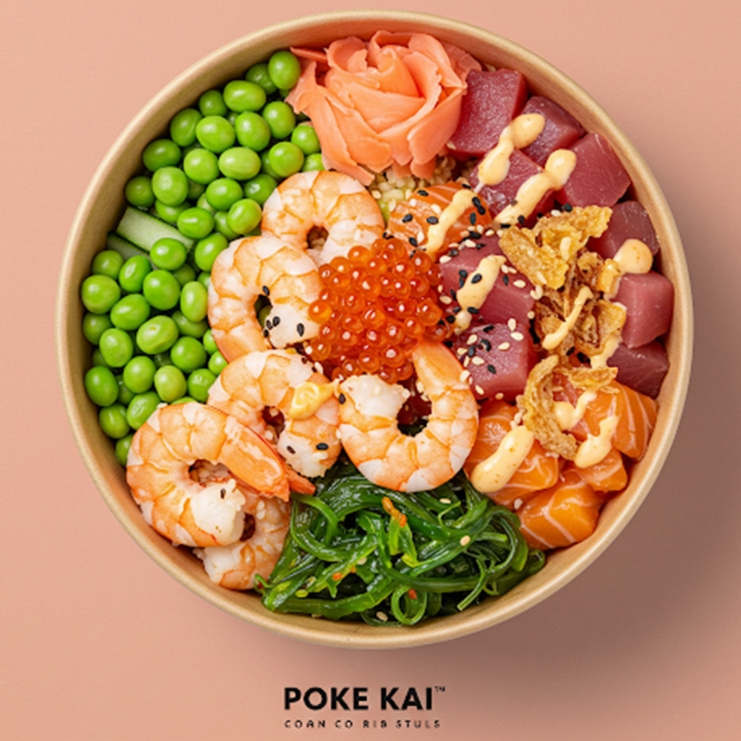 Seafood poke bowl with shrimp, salmon, roe and edamame