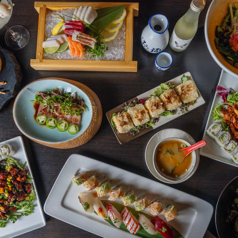 The dark-themed stylistic images feature a wide variety of Japanese dishes.