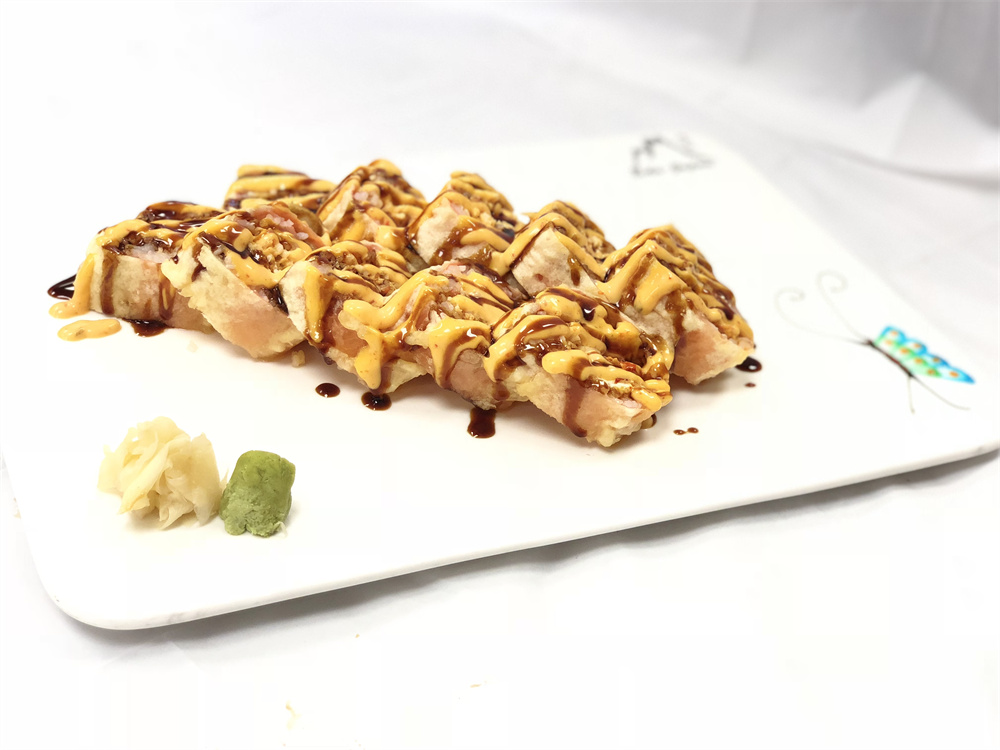Crispy fried sushi slices drizzled with spicy mayo and teriyaki sauce at Edo Japan, a Japanese Restaurant in Texas City