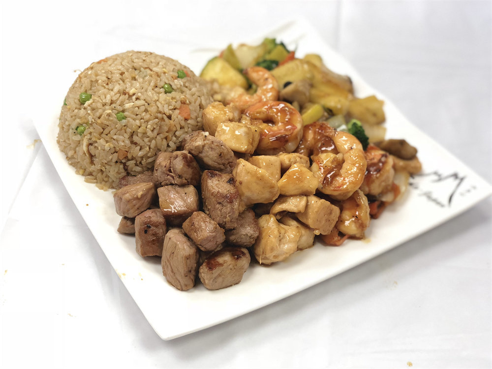 Triple meat combo plate with fried rice, shrimp, beef and glazed chicken chunks at Edo Japan, a Japanese Restaurant in Texas City