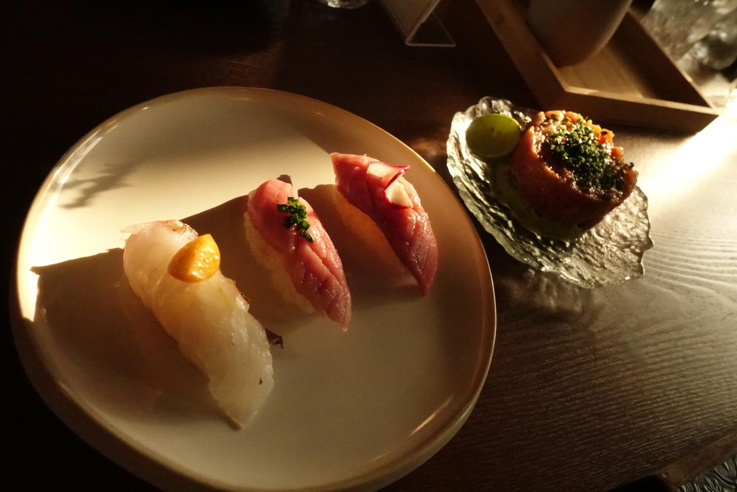 Assorted nigiri sushi with side seafood tartare at EGAWA, a Japanese Restaurant in Malvern
