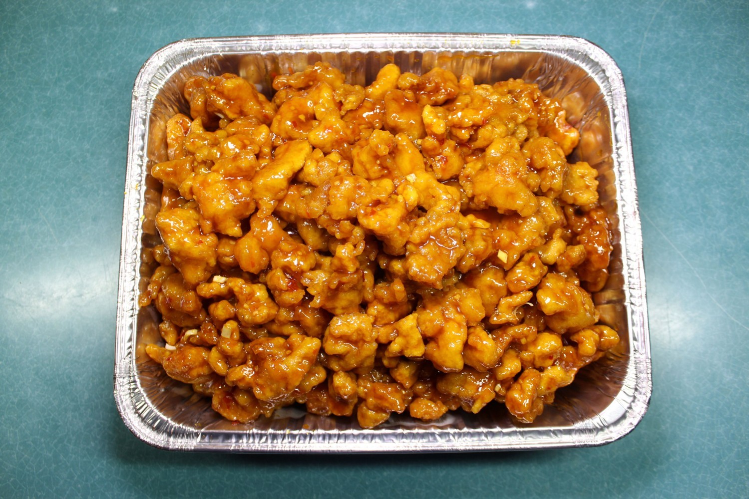 Crispy chicken chunks covered in sweet spicy glossy sauce at Elgin Buffet, a Buffet Restaurant in Elgin
