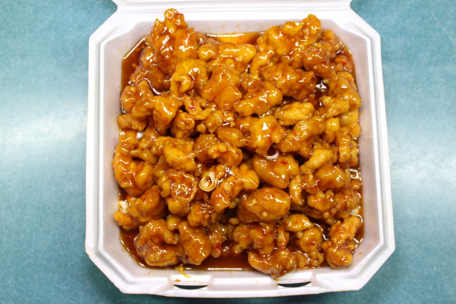 Spicy sweet glazed orange flavored chicken bites at Elgin Buffet, a Buffet Restaurant in Elgin