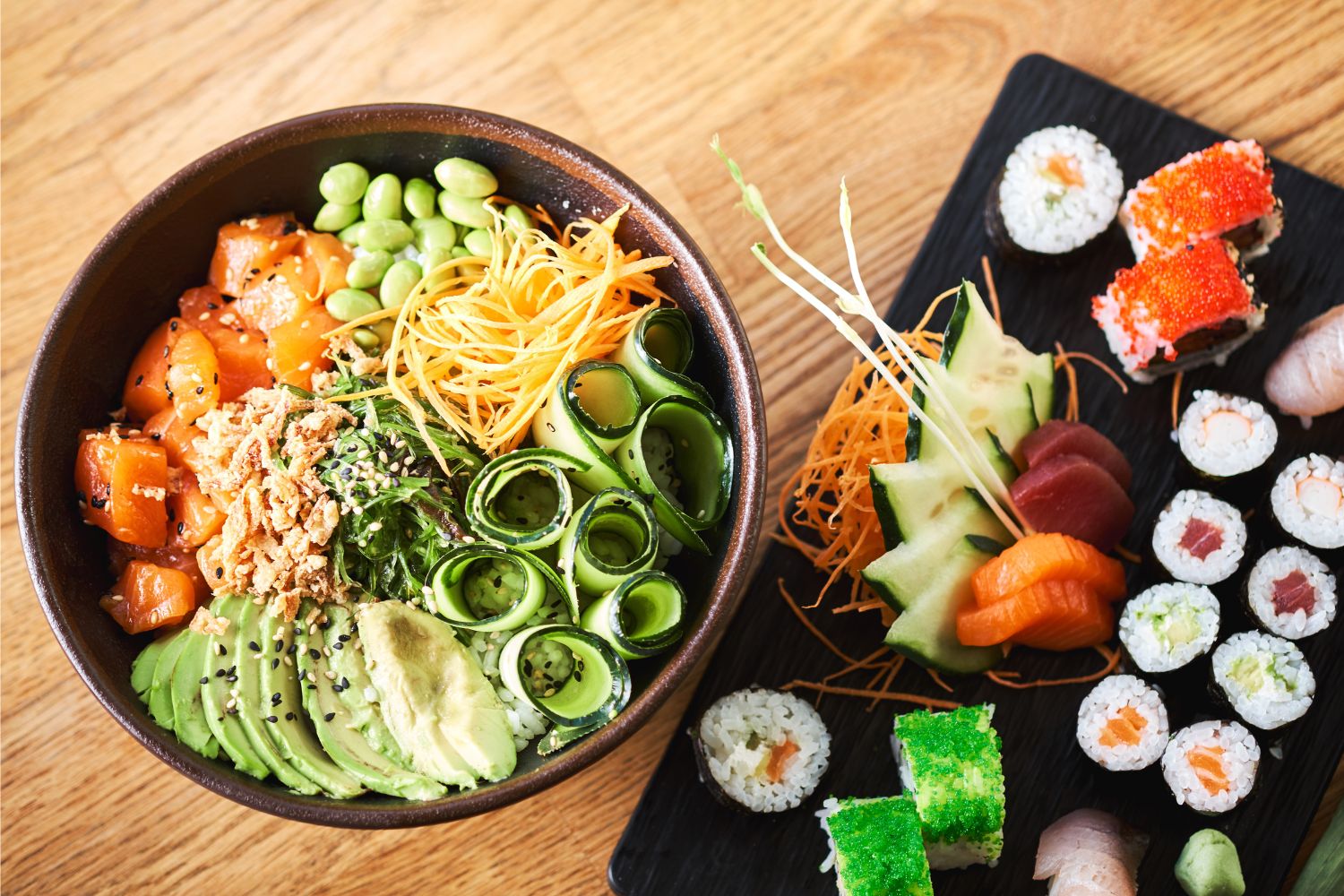 Salmon poke bowl paired with assorted nigiri and maki at Chop Asian Kitchen, a Asian Fusion Restaurant in Amityville