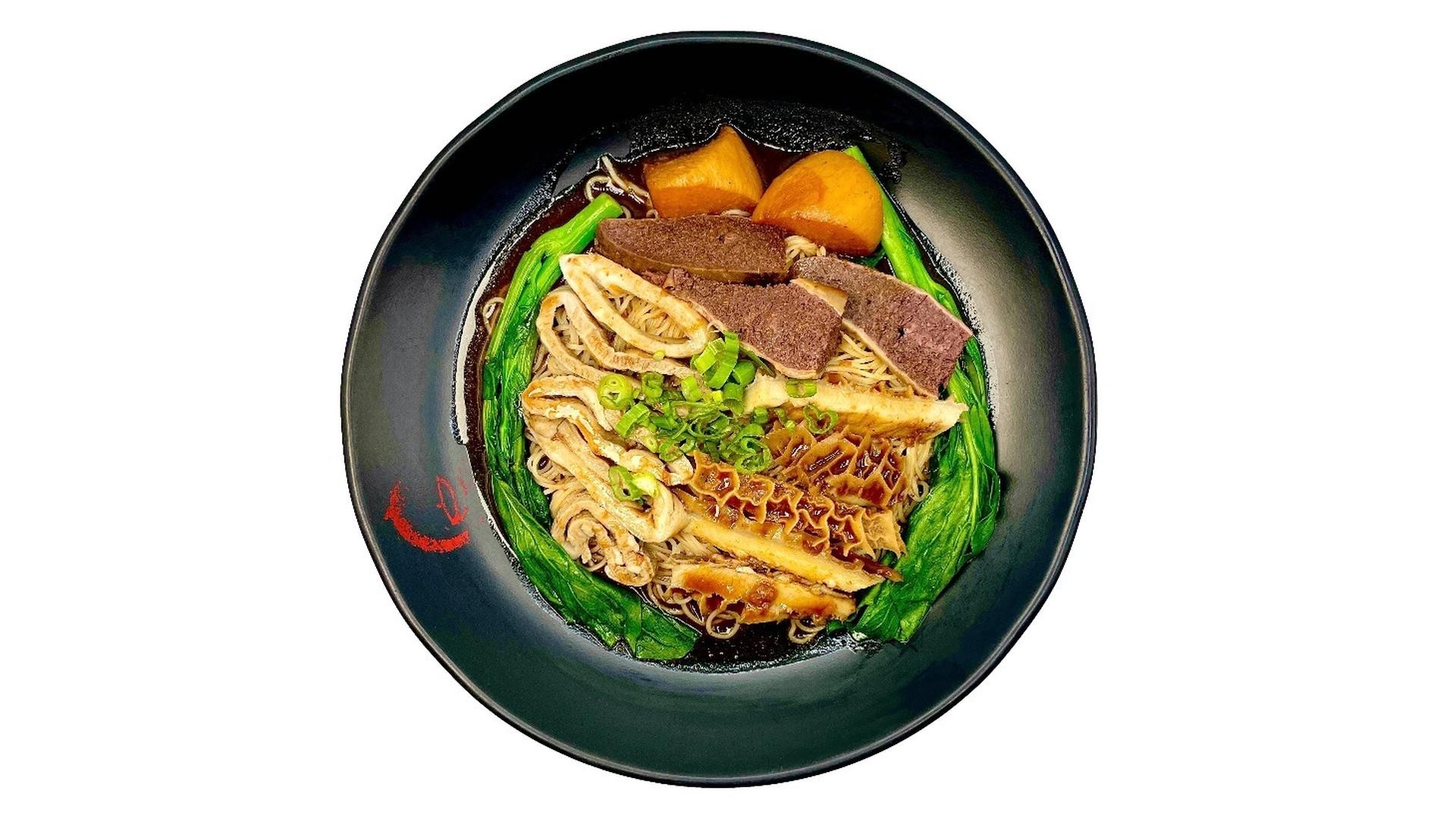 Offal beef noodles with greens at E Noodle, a Chinese Restaurant in Brooklyn