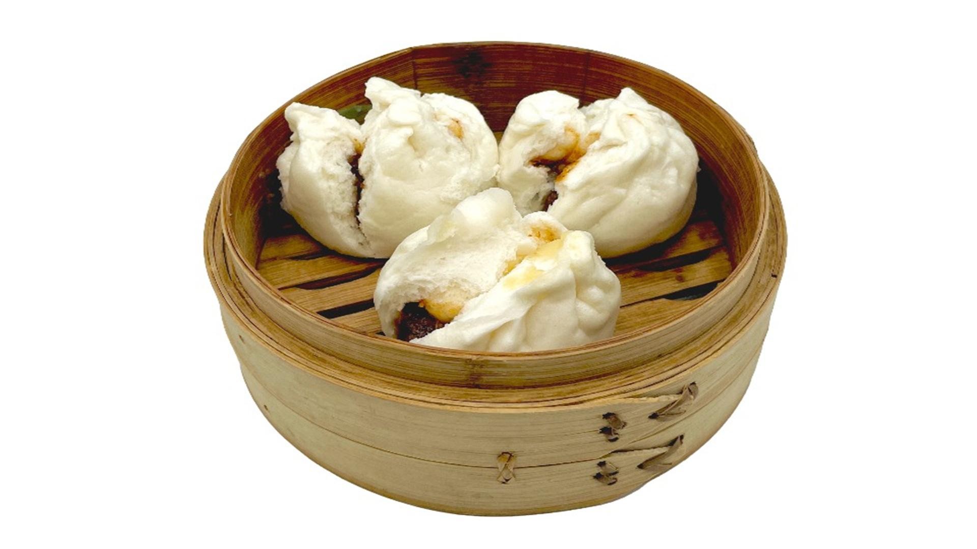Steamed barbecue pork buns in bamboo steamer at E Noodle, a Chinese Restaurant in Brooklyn