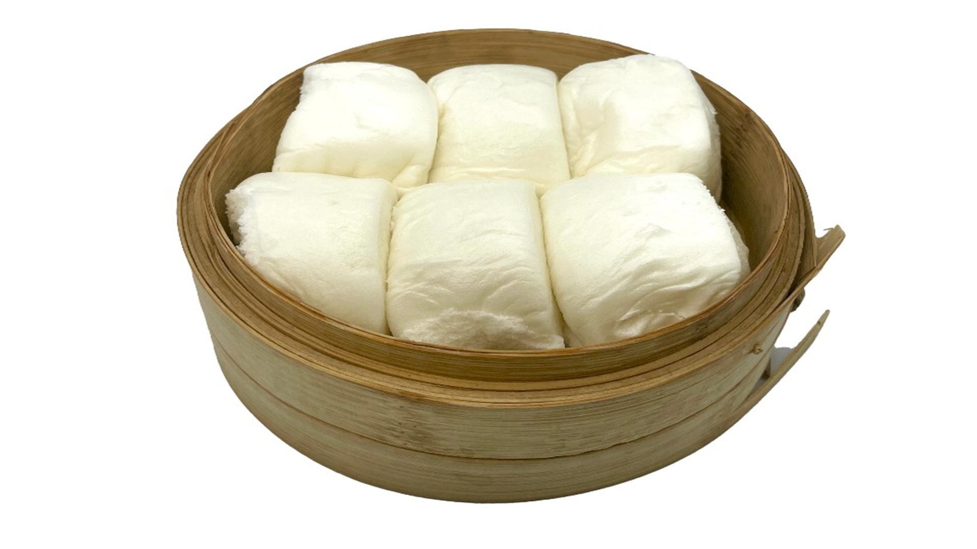 Steamed soft white buns in bamboo steamer at E Noodle, a Chinese Restaurant in Brooklyn