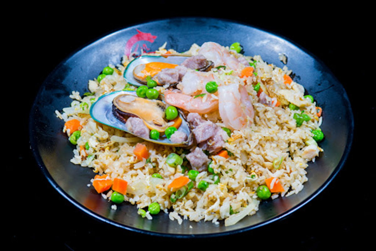 Seafood fried rice with mussels, shrimp, peas, carrot and diced pork at E Noodle Chinatown, a Chinese Restaurant in New York